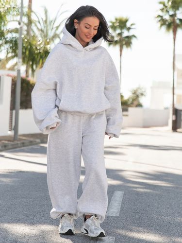 Spodnie dresowe bawełniane damskie baggy szerokie oversize szary melanż na Arena.pl