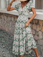 Sukienka damska wyszczuplająca w kwiaty elastyczna elegancka jasnozielony