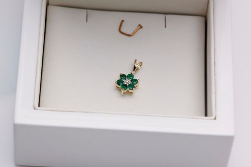 złoty wisiorek kwiatek - szmaragdy i brylant na Arena.pl