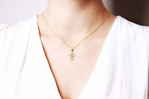 złoty krzyżyk mały z cyrkoniami - piękno w czystej postaci na Arena.pl