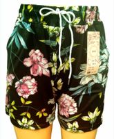 SPODENKI Krótkie szorty damskie z kieszeniami elastyczne w kwiaty 4XL