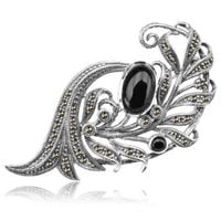 srebrna broszka pióro z onyksem i markazytami