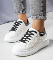 Biało-czarne sneakersy zdobione perforacją Erin 39