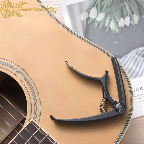 Kapodaster do gitary klasycznej czarny na Arena.pl