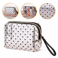 kosmetyczka damska transparentna czarne serca 12x18x8cm ks126