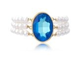 bransoletka z pereł z dużym, mieniącym się kamieniem primero