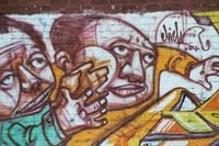 FOTOTAPETA POSTACIE GRAFFITI MUR TWARZE 260x180