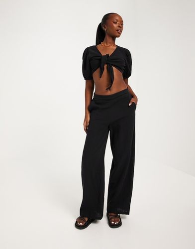 SPODNIE CASUAL KIESZENIE 6VM NG5__S VERO MODA MUŚLINOWE CZARNE na Arena.pl