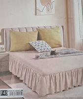 Kremowe luksusowe prześcieradło z falbanką