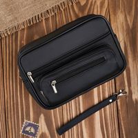 saszetka męska skórzana do ręki praktyczna duża czarna abruzzo abr-12