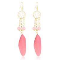 Kolczyki z piórkami Łapacze Snów 12 cm różowe