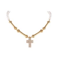 choker z pereł i kosteczek z kryształowym krzyżykiem aria rockstar c