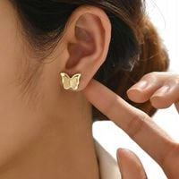 KOLCZYKI ZŁOTE MOTYLKI STAL CHIRURGICZNA MOTYLE POZŁACANE