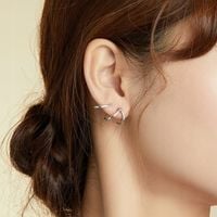 K421 Srebrne kolczyki delikatne fale sztyfty srebro 925